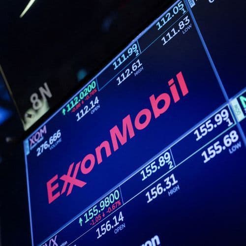 Wall Street drifts near its record high as Exxon Mobil climbs